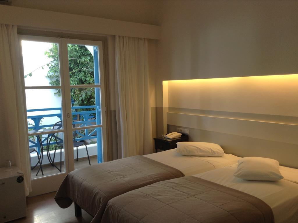 Kamari Beach Hotel Bagian luar foto